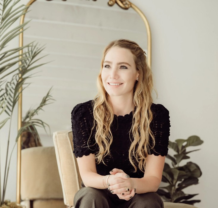 Maggie Stevenson, LCSW, seated in her Boulder office